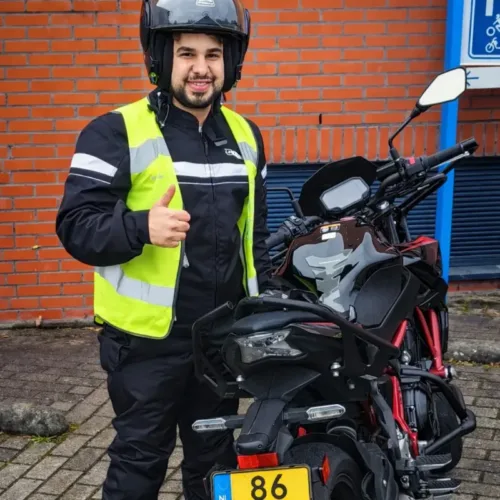 Expat student who passed his motorcycle driving exam in Amsterdam with Roadkingz Driving School after taking English driving lessons